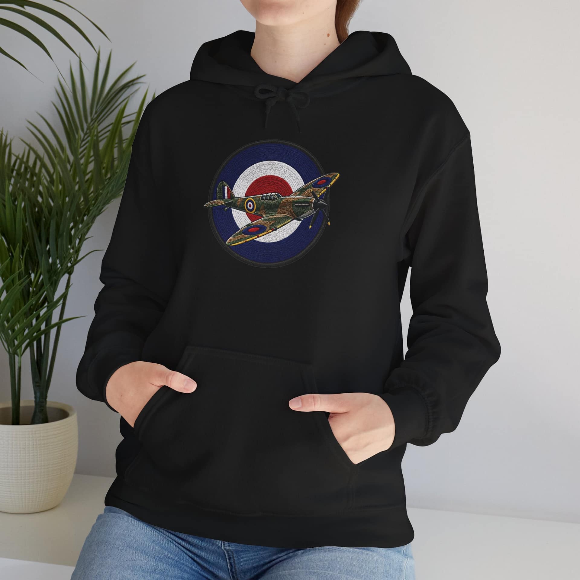 Model wearing Spitfire Vintage RAF Roundel Hoodie with WWII fighter plane artwork