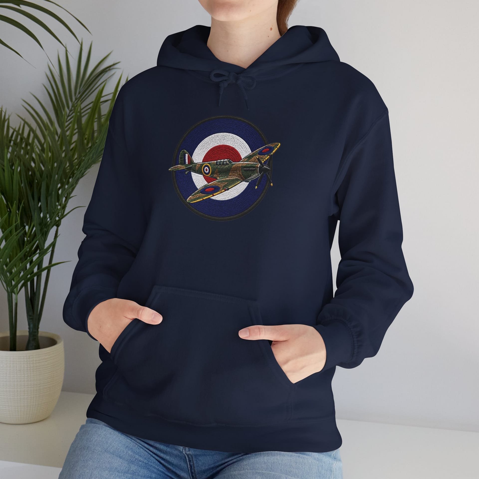Model wearing Spitfire Vintage RAF Roundel Hoodie with WWII fighter plane artwork