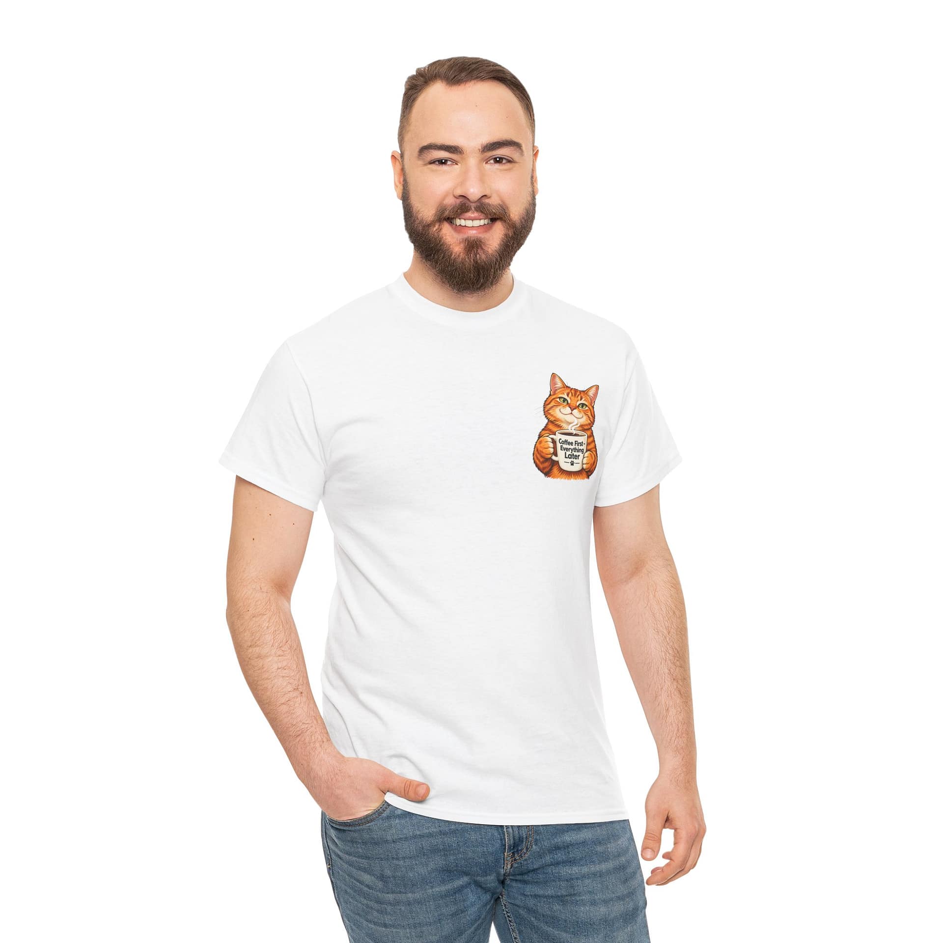 Cute orange cat holding a ‘But First Coffee’ mug printed on a unisex T‑shirt
