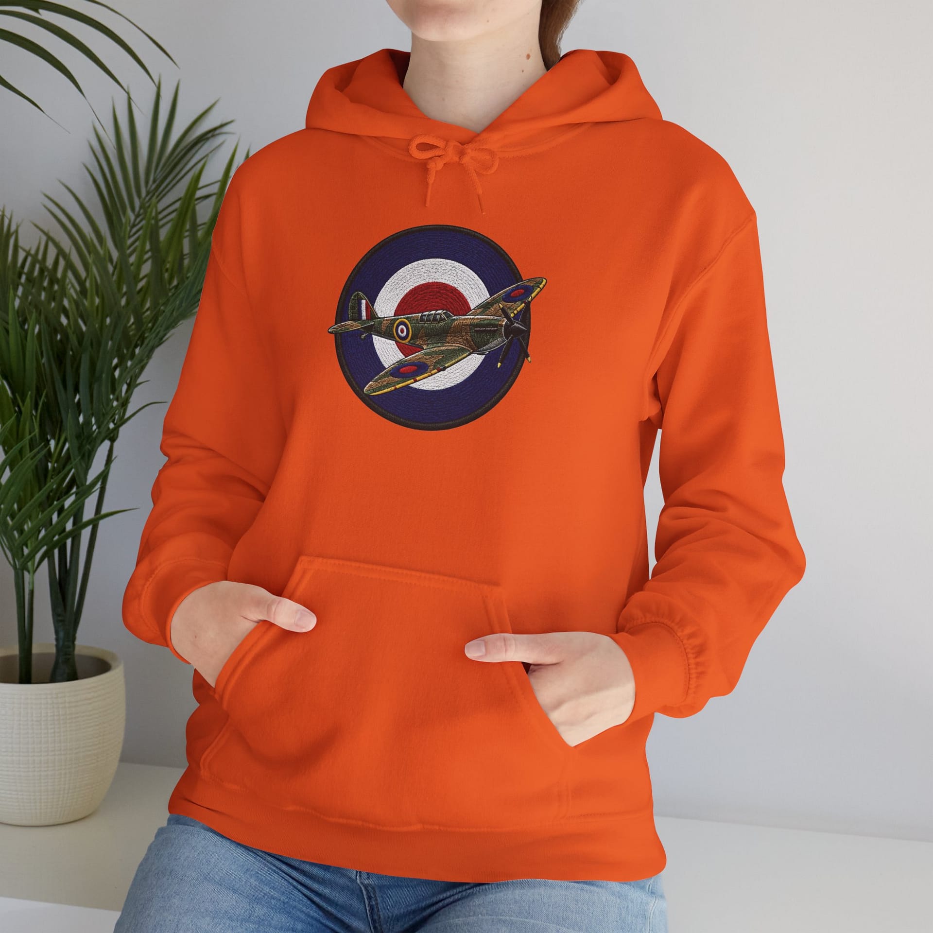 Model wearing Spitfire Vintage RAF Roundel Hoodie with WWII fighter plane artwork