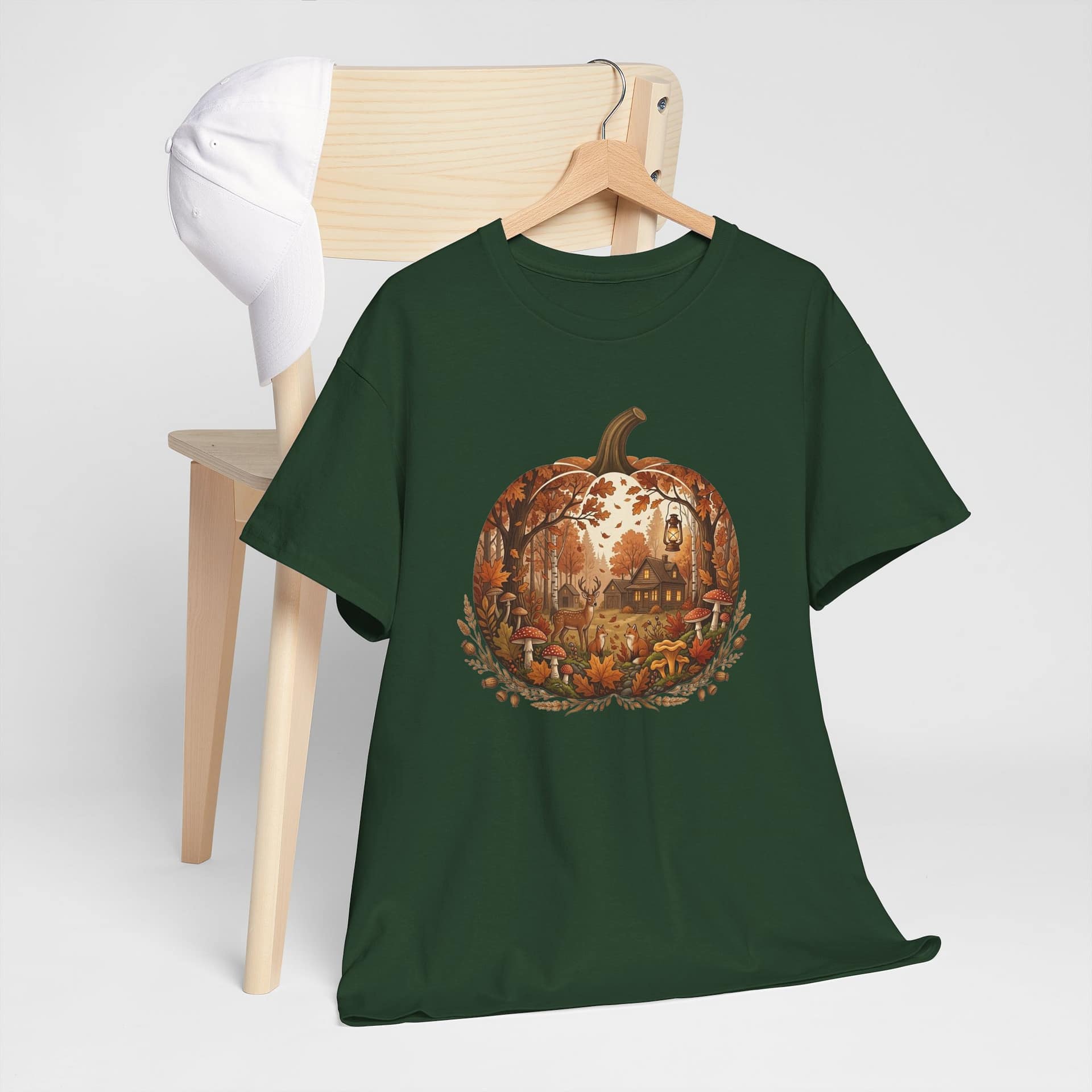 Close‑up of autumn pumpkin scene graphic on cosy fall T‑shirt