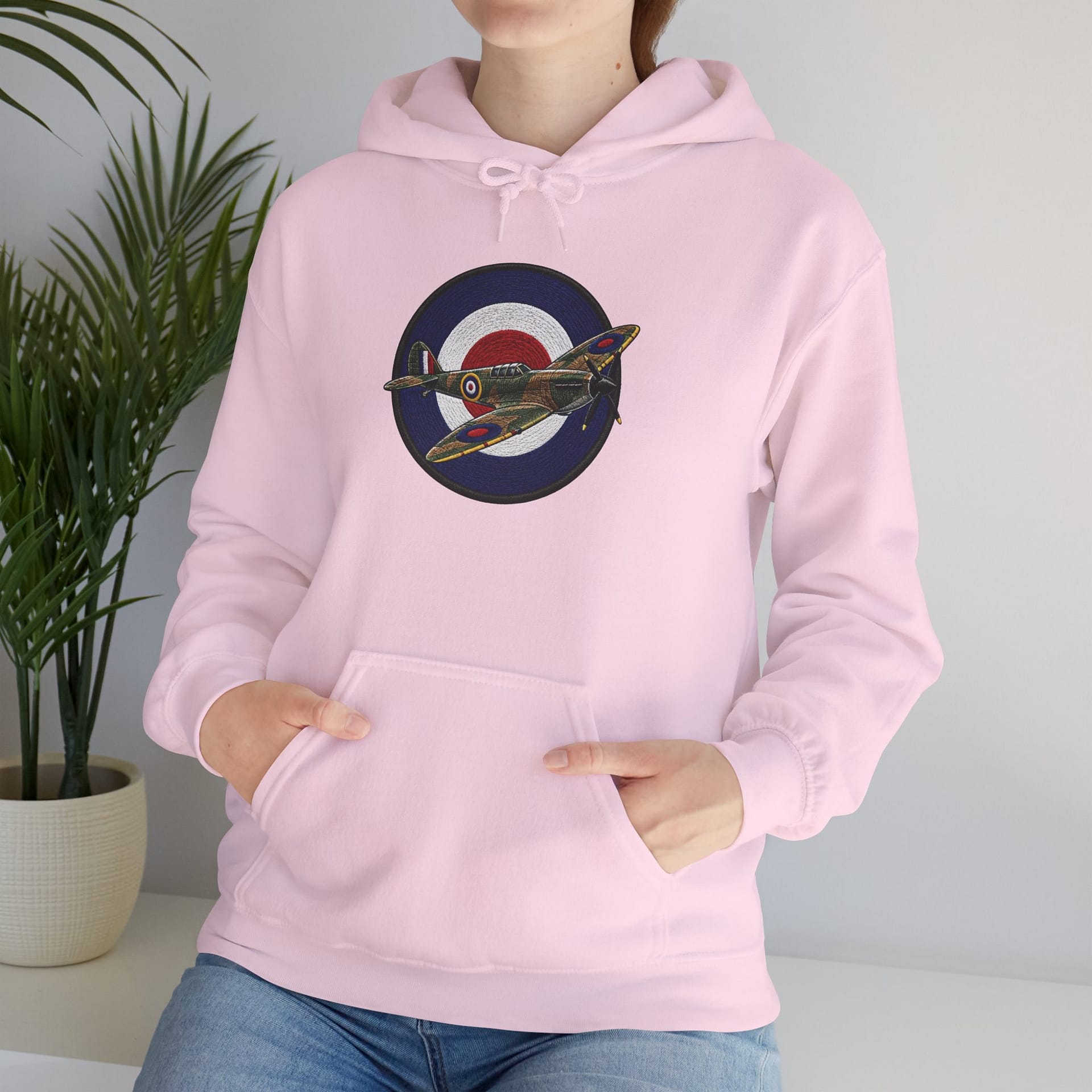 Model wearing Spitfire Vintage RAF Roundel Hoodie with WWII fighter plane artwork